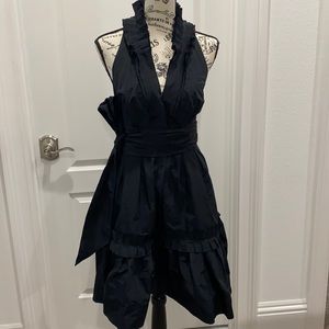 Black halter and open back BCBG Dress.